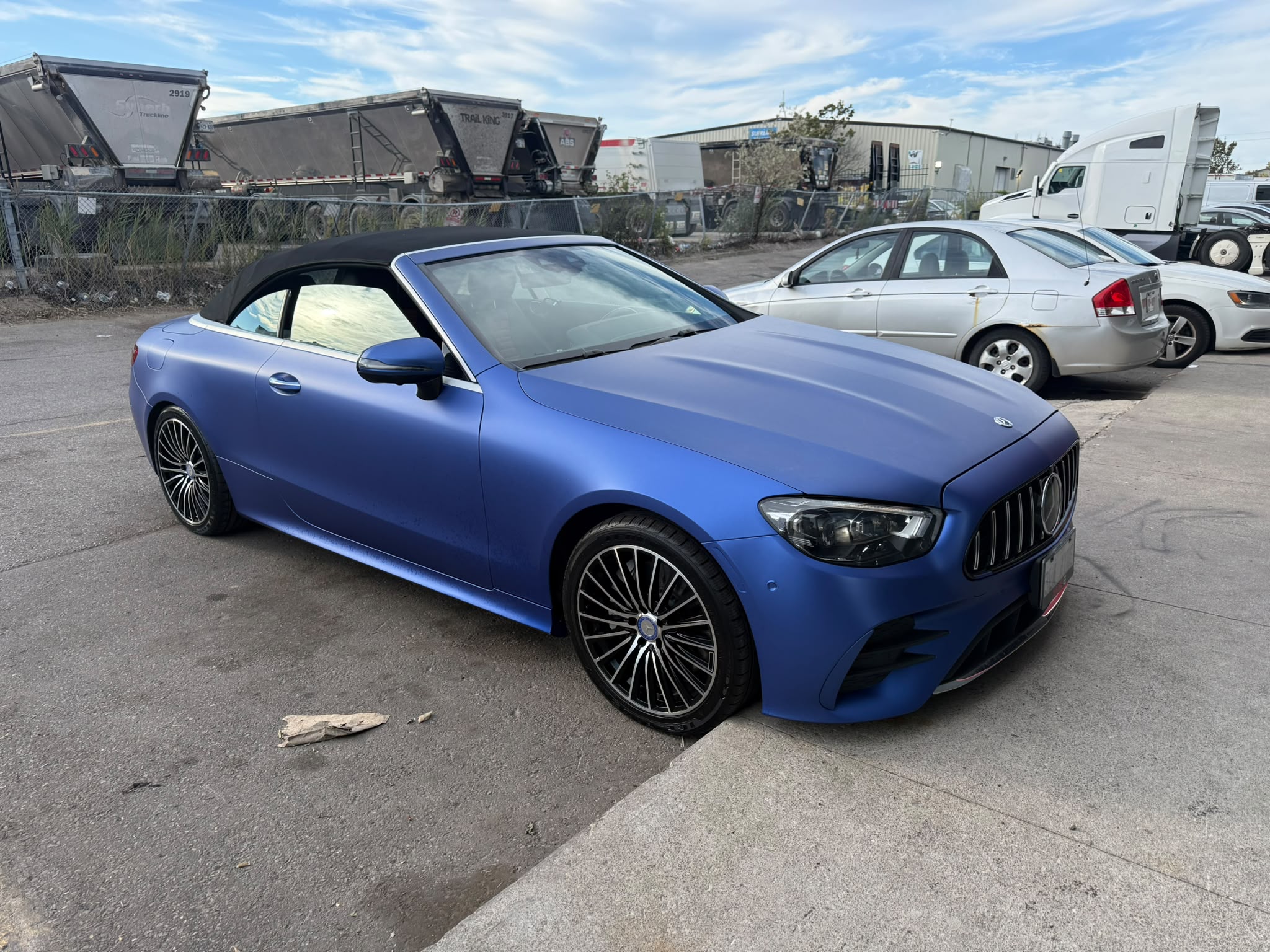 Blue Mercedes convertible outside Let’s Fix Auto